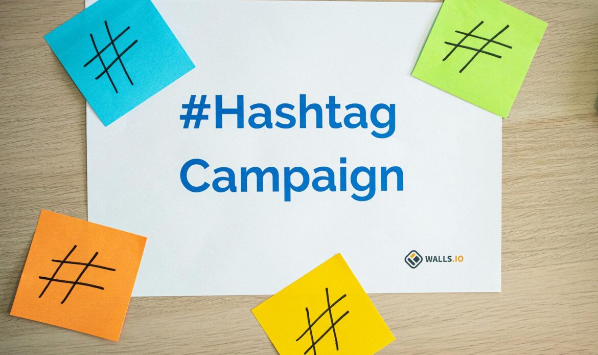 Colorful sticky notes arranged around a hashtag campaign sign, ideal for social media marketing concepts.